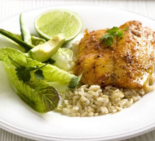 Red spiced fish with green salad