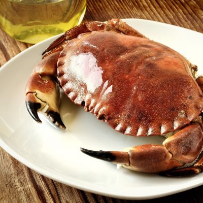 16941612 - boiled crab on a old wooden table